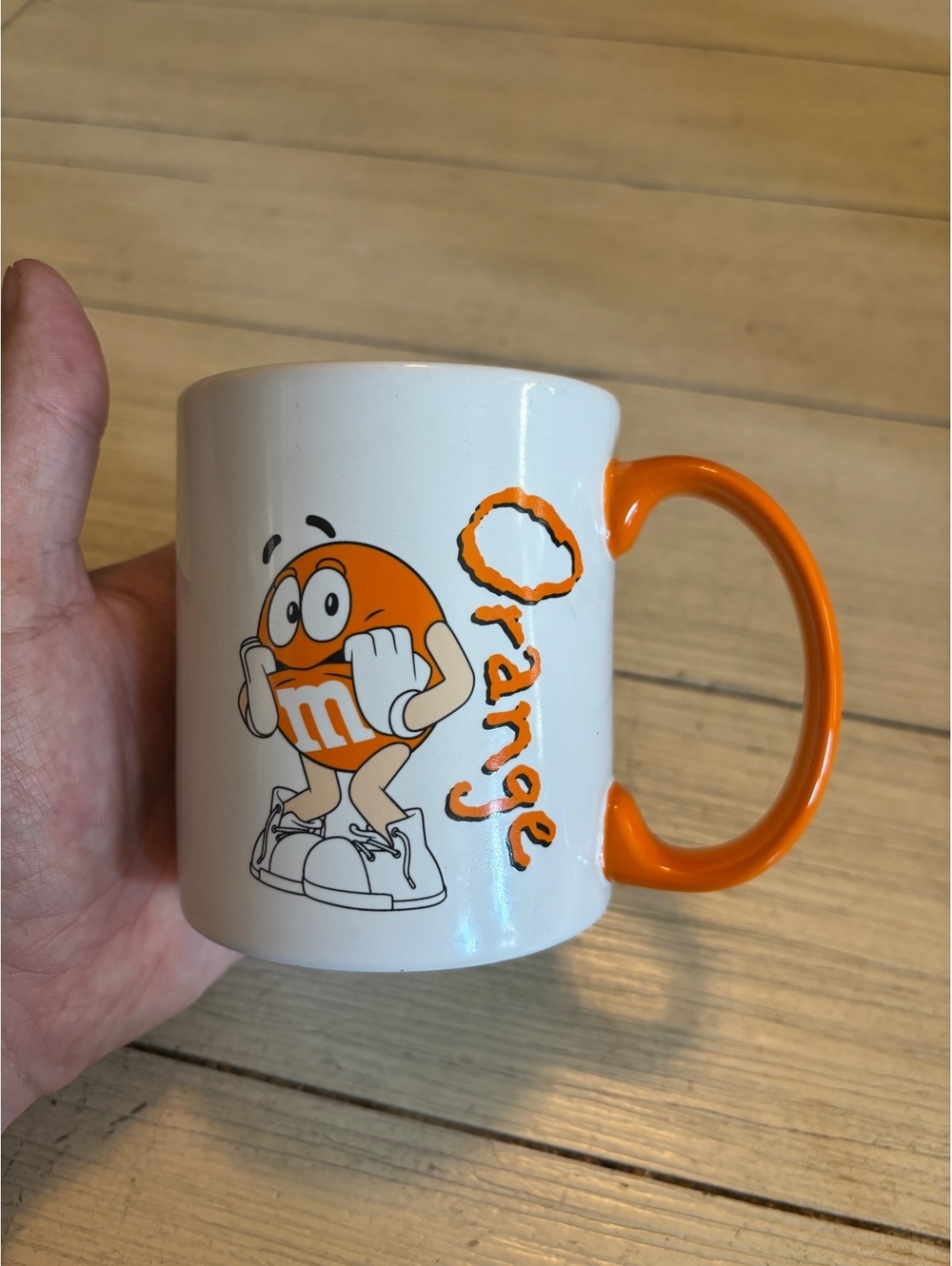 2012 M&M’s World Orange Character Coffee Mug Ceramic Mars Candy White Orange